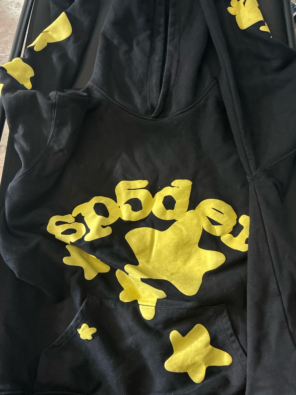 Black Hoodie with Yellow Star Graphic Pullover